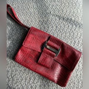 Dana Buchman red snakeskin like wallet with strap.